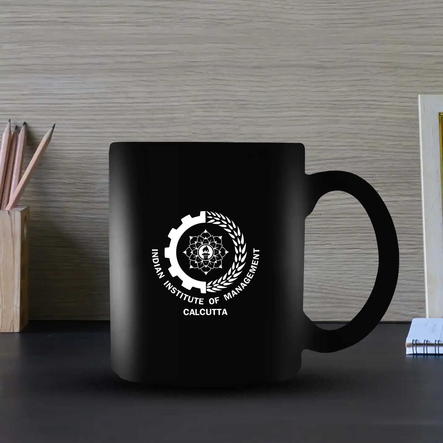 Premium IIMC Merchandise Sandcarved Black Mugs