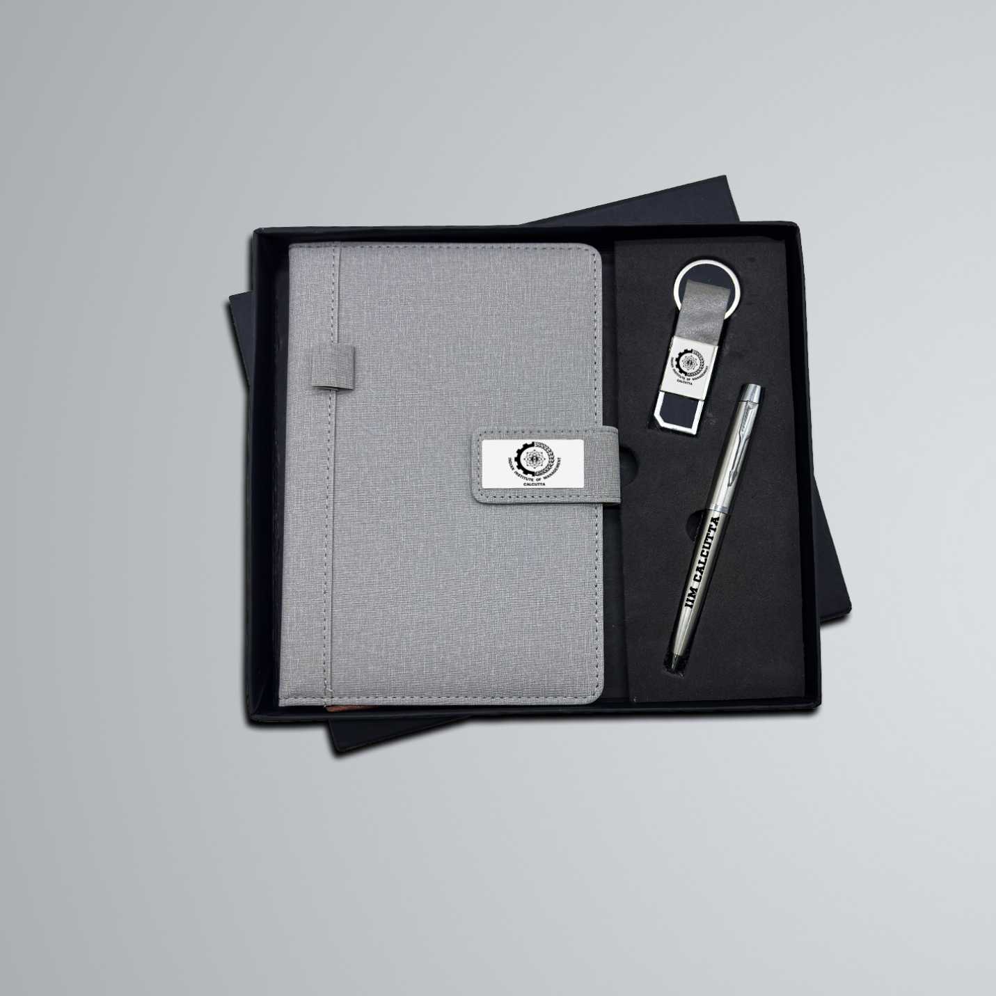 Elegant Combo Pack – Diary, Keychain & IIMC Logo Pen